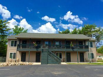 Lucky Horseshoe Cabins Hotel Au Sable Esterno foto