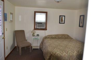 Lucky Horseshoe Cabins Hotel Au Sable Esterno foto